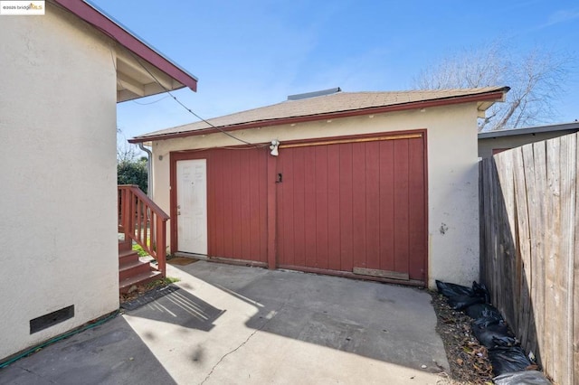 view of outdoor structure with a garage