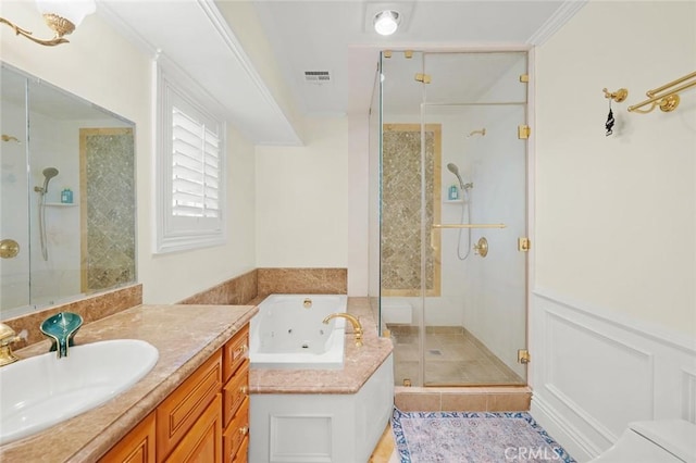 bathroom featuring vanity, independent shower and bath, and crown molding