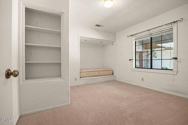 unfurnished bedroom with carpet