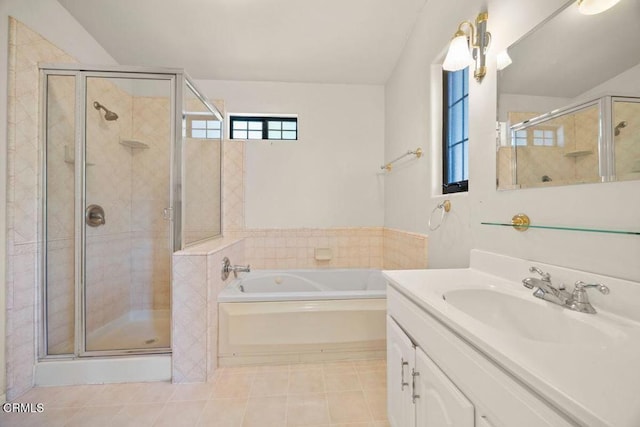 bathroom with vanity, tile patterned flooring, and separate shower and tub