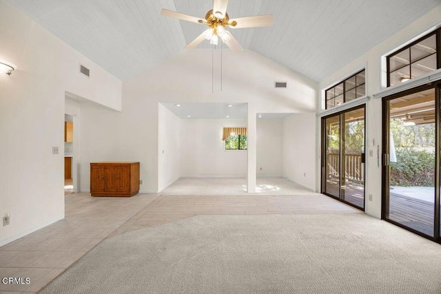 unfurnished room with high vaulted ceiling, ceiling fan, light tile patterned floors, and wood ceiling