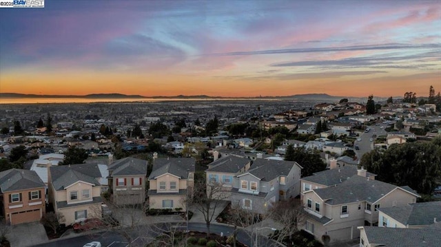 aerial view at dusk with a mountain view