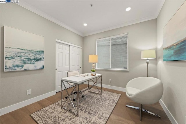 office area with hardwood / wood-style flooring and ornamental molding