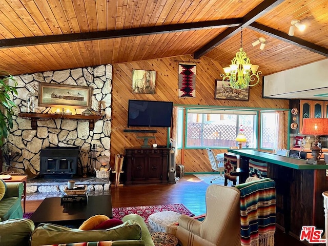 living room with wooden ceiling, vaulted ceiling with beams, and a notable chandelier