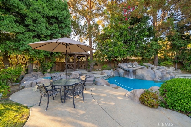 view of swimming pool featuring a patio