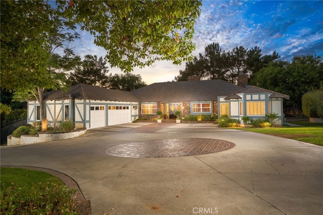 single story home featuring a garage