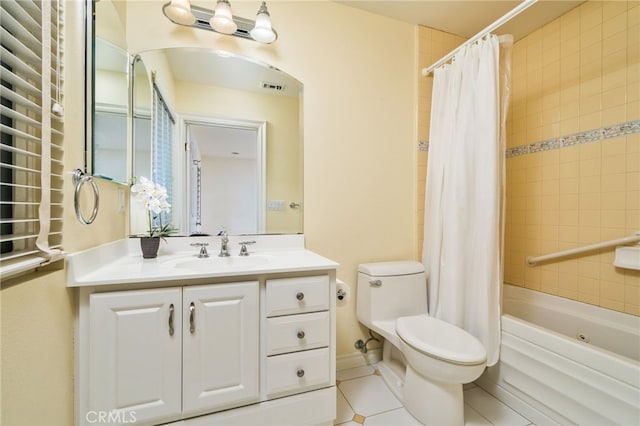 full bathroom with toilet, tile patterned floors, shower / bath combo, and vanity