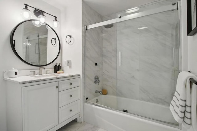 bathroom featuring vanity and enclosed tub / shower combo