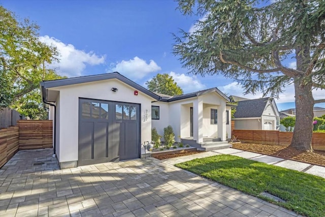 view of front of home featuring a garage