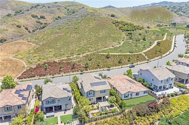 drone / aerial view featuring a mountain view