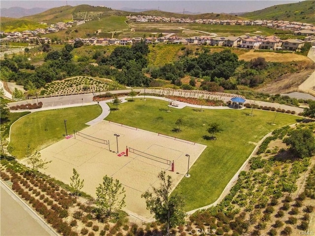 birds eye view of property featuring a mountain view