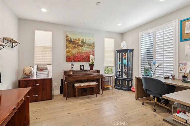 office space featuring light wood-type flooring