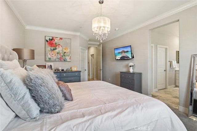 carpeted bedroom with ornamental molding, connected bathroom, and an inviting chandelier