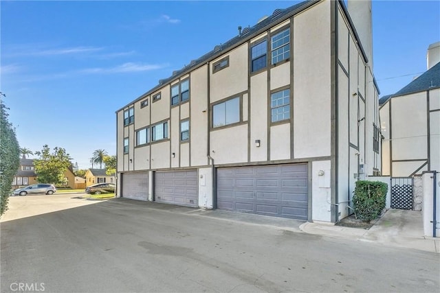 exterior space with a garage