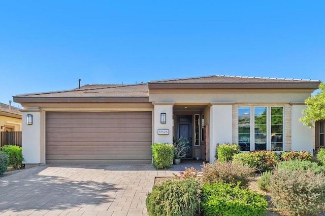 prairie-style home with a garage