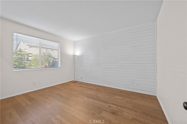 empty room featuring hardwood / wood-style floors