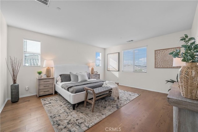 bedroom featuring hardwood / wood-style floors