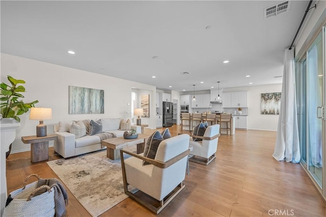 living room featuring light hardwood / wood-style floors