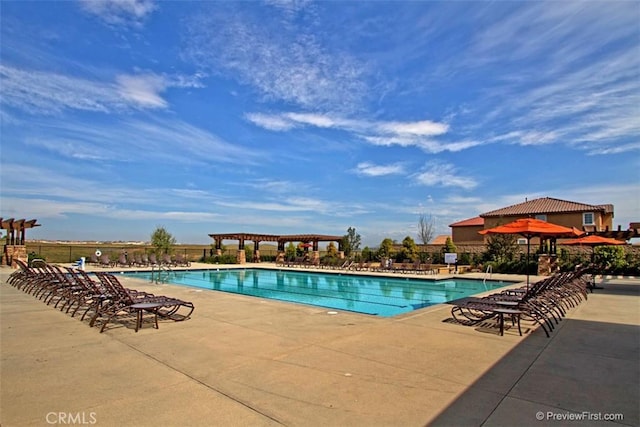 view of swimming pool with a gazebo