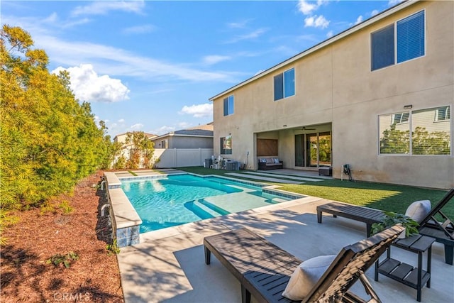 view of swimming pool with central AC unit and a patio area