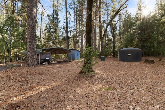 view of yard with a carport