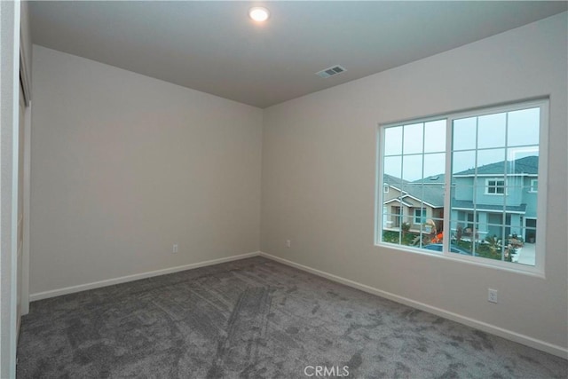 view of carpeted spare room