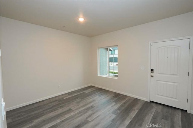 entrance foyer featuring dark hardwood / wood-style floors