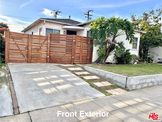 exterior space with a front yard