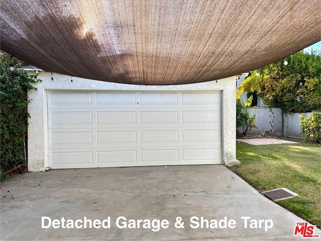 garage featuring a yard