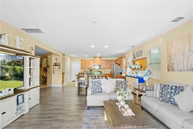 living room featuring light wood-type flooring