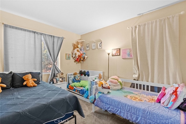 bedroom featuring carpet