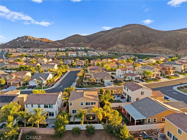 bird's eye view with a mountain view