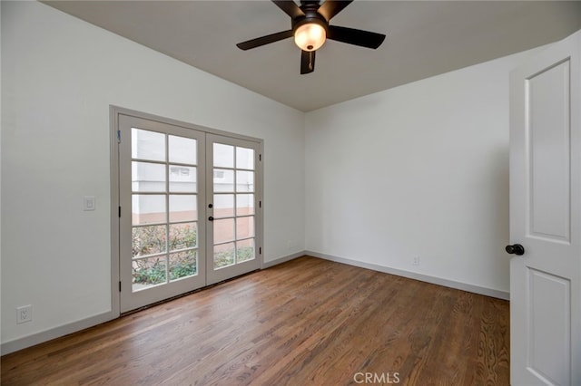 unfurnished room with french doors, hardwood / wood-style floors, and ceiling fan