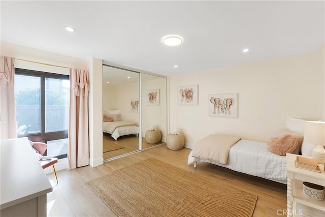 bedroom featuring light hardwood / wood-style flooring