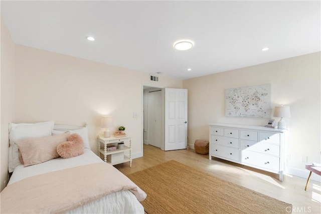 bedroom featuring light wood-type flooring