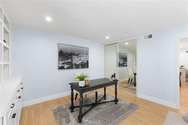 home office featuring light wood-type flooring