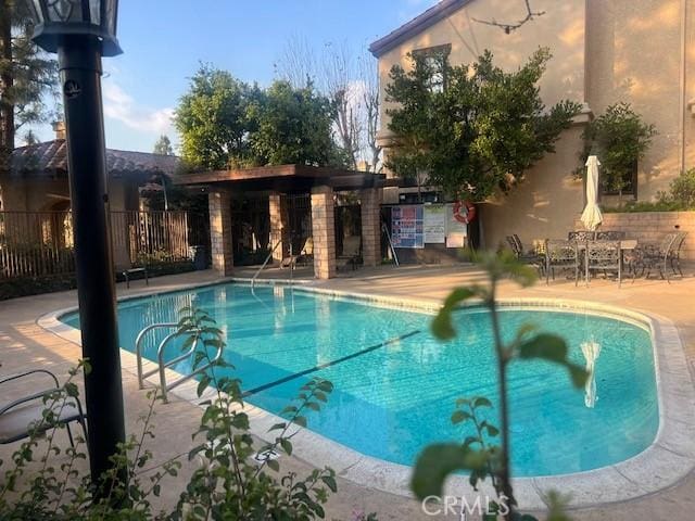 view of pool with a patio area