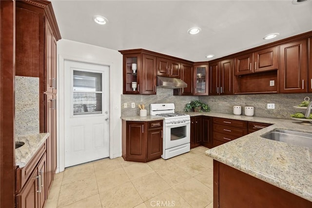 1824 S Marengo Ave Unit 27, Alhambra, CA 91803 - kitchen with gas range gas stove, a sink, backsplash, under cabinet range hood, and recessed lighting