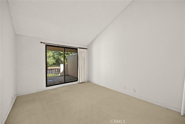 1824 S Marengo Ave Unit 27, Alhambra, CA 91803 - carpeted empty room featuring vaulted ceiling and baseboards