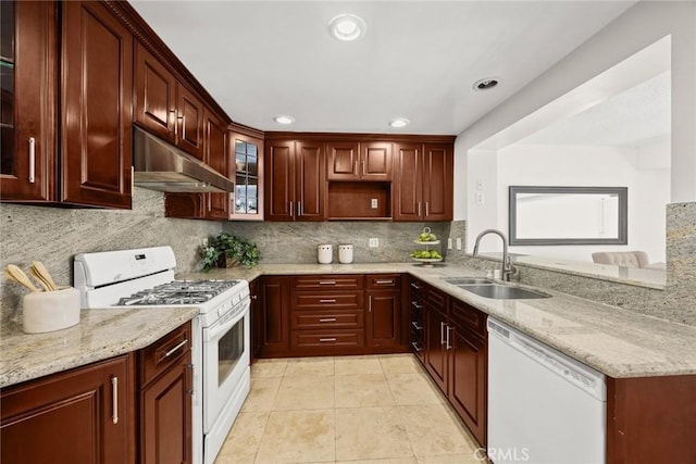 1824 S Marengo Ave Unit 27, Alhambra, CA 91803 - kitchen with white appliances, a sink, under cabinet range hood, light stone countertops, and recessed lighting