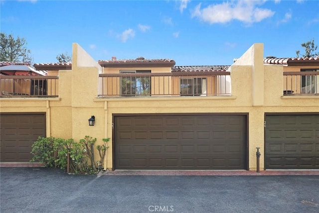 1824 S Marengo Ave Unit 27, Alhambra, CA 91803 - multi unit property featuring stucco siding, a tile roof, and a garage