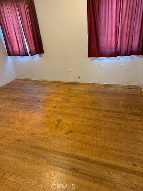 spare room featuring light wood-type flooring