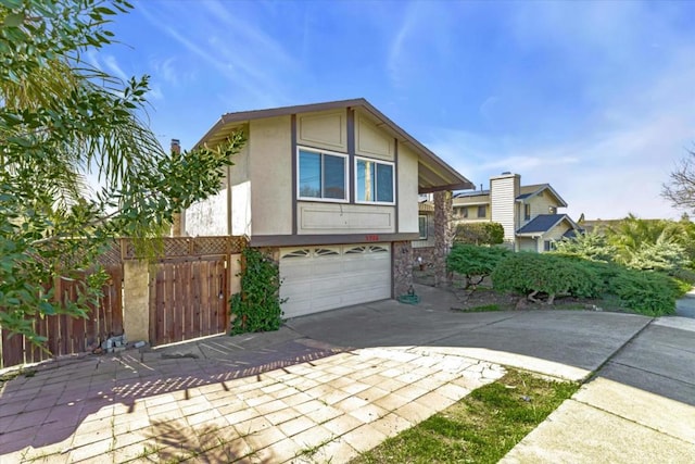 view of front of property with a garage