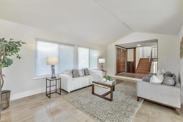 living room with vaulted ceiling