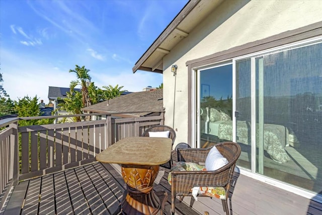 wooden balcony featuring a wooden deck