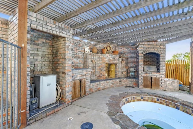 view of patio / terrace featuring a fireplace