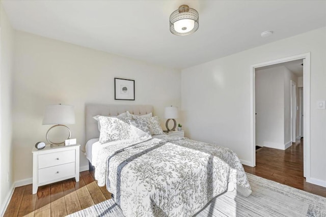 bedroom featuring wood-type flooring