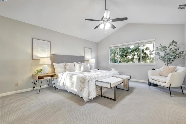 bedroom with ceiling fan, carpet floors, and vaulted ceiling