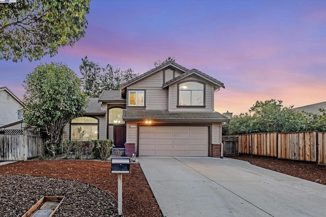 view of property with a garage