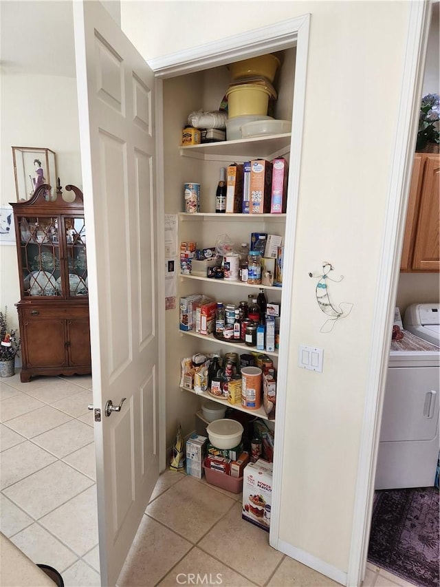 pantry with independent washer and dryer